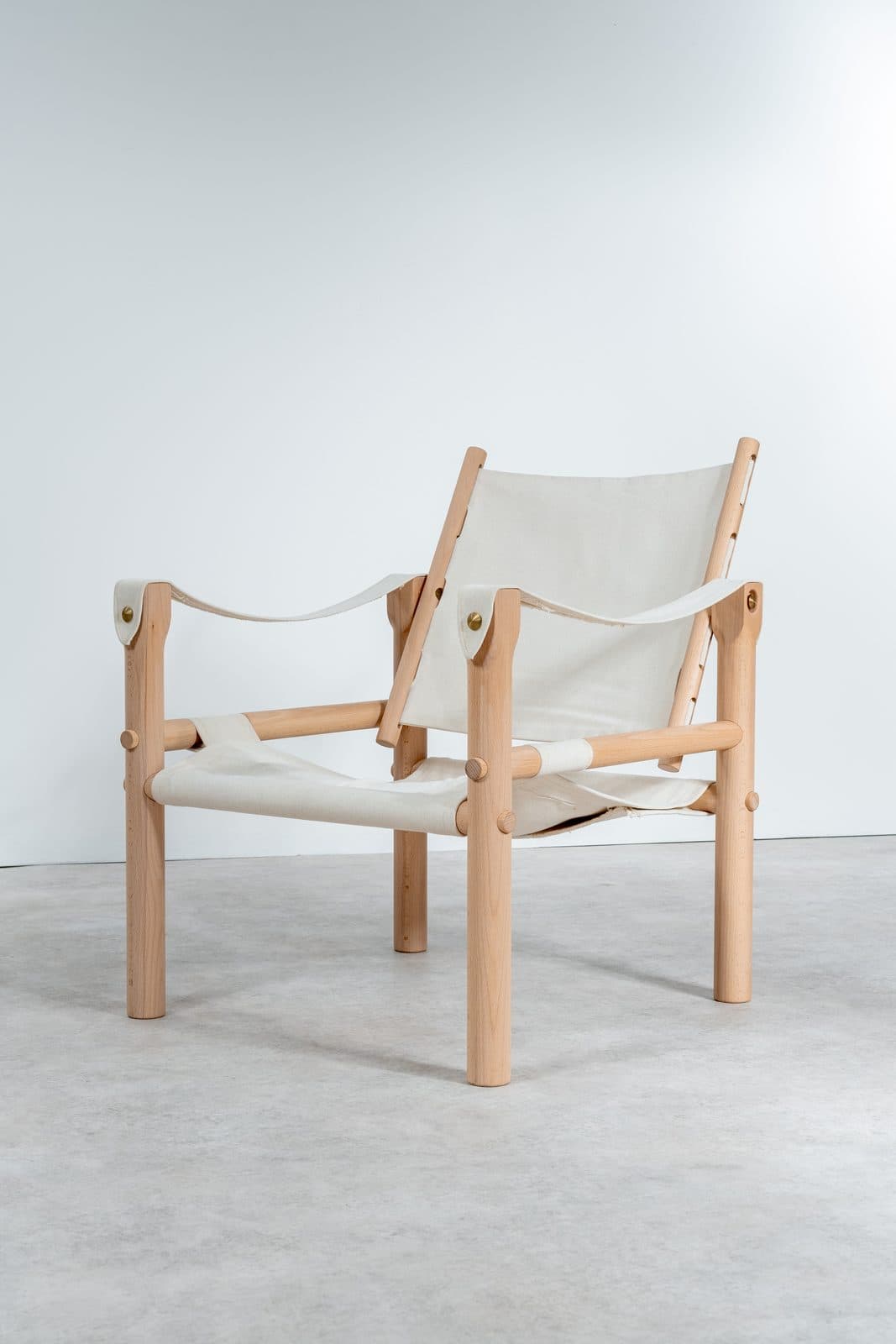 Chair with natural canvas upholstery by Aileen Crowley
