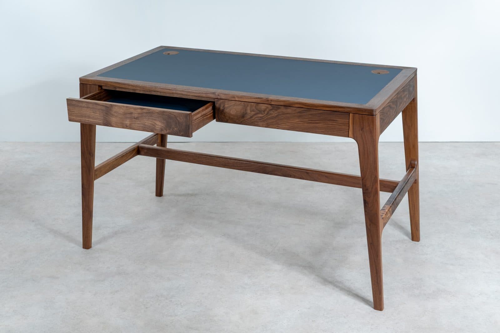 Walnut desk with a blue linoleum top by David Wraith