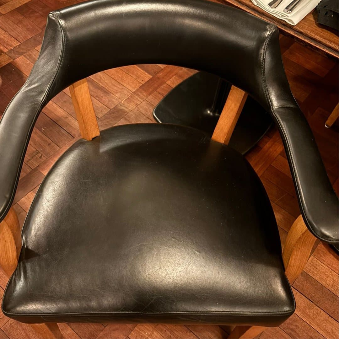 Hawksmoor leather chair after its seat was rebuilt and re-covered