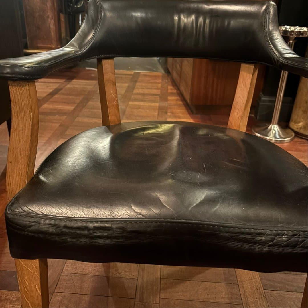 Hawksmoor leather chair with compressed seat before rebuilding