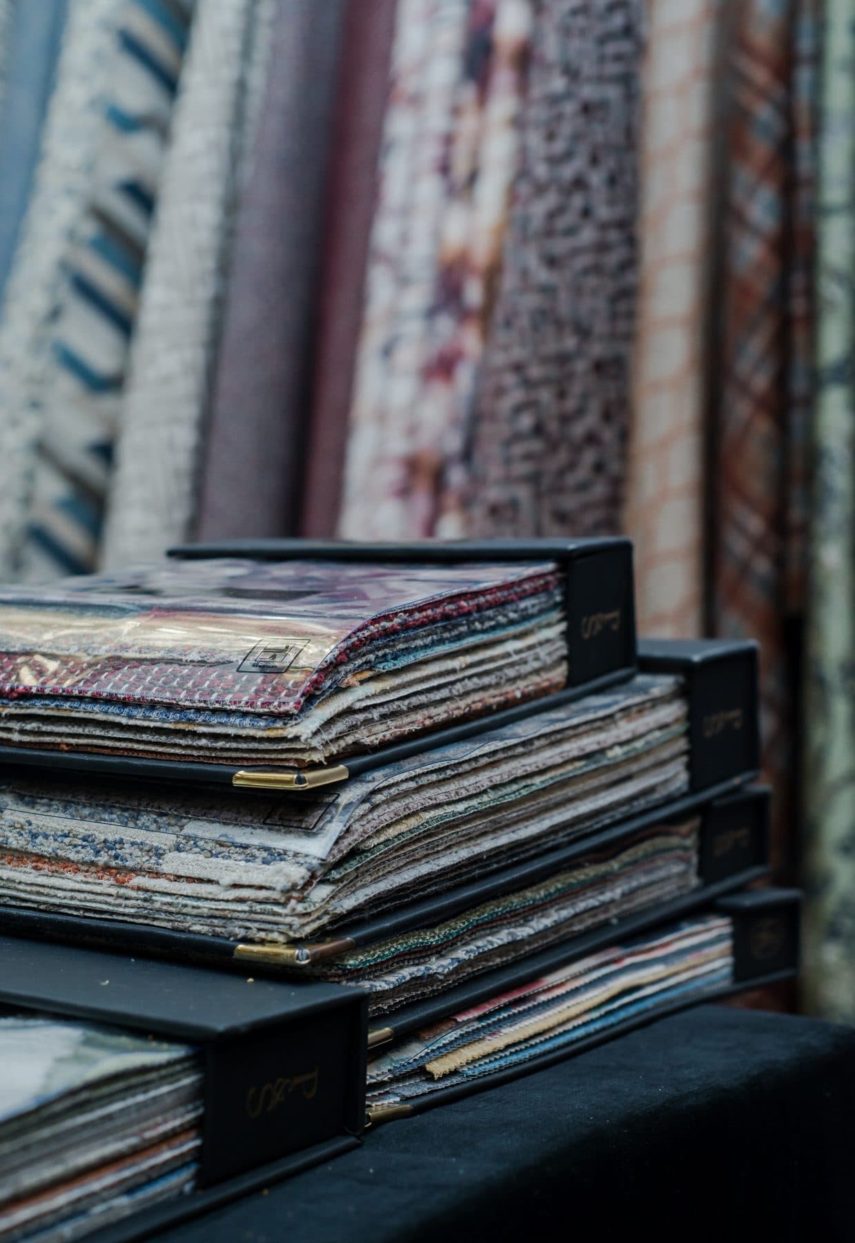 Fabric sample books on an exhibitor stand