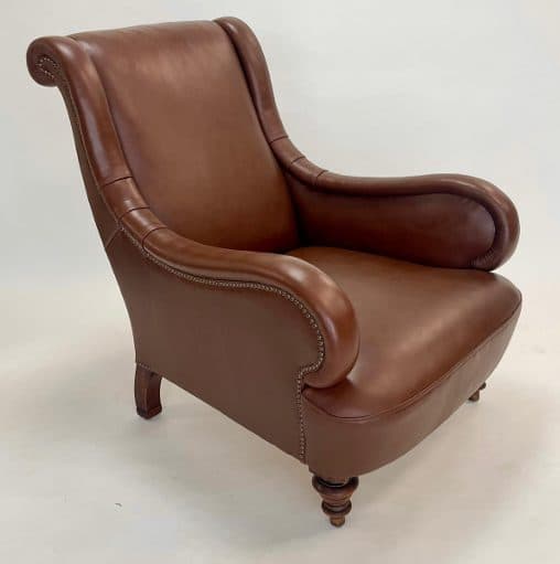 The finished leather club chair by Annabel Lloyd, three-quarter view