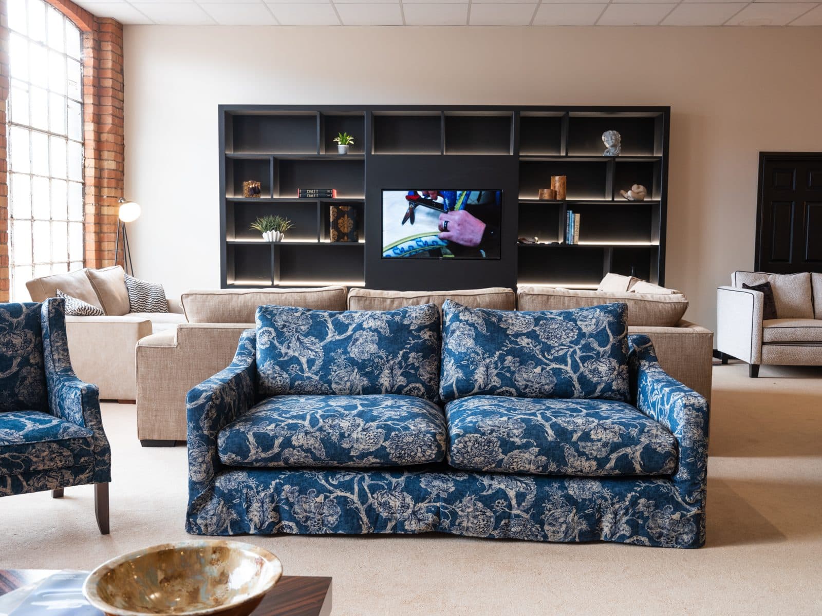 Sofas on show in the Wallace and Howe showroom at Autumn Long Point 2026