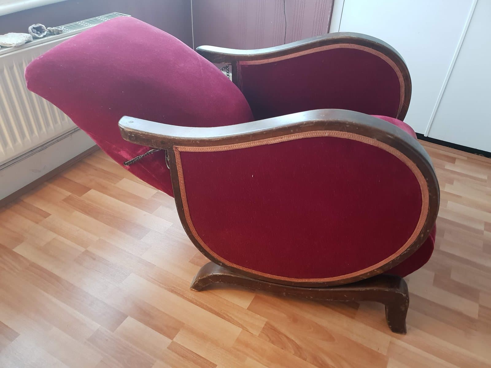 The recliner before restoration, reclined