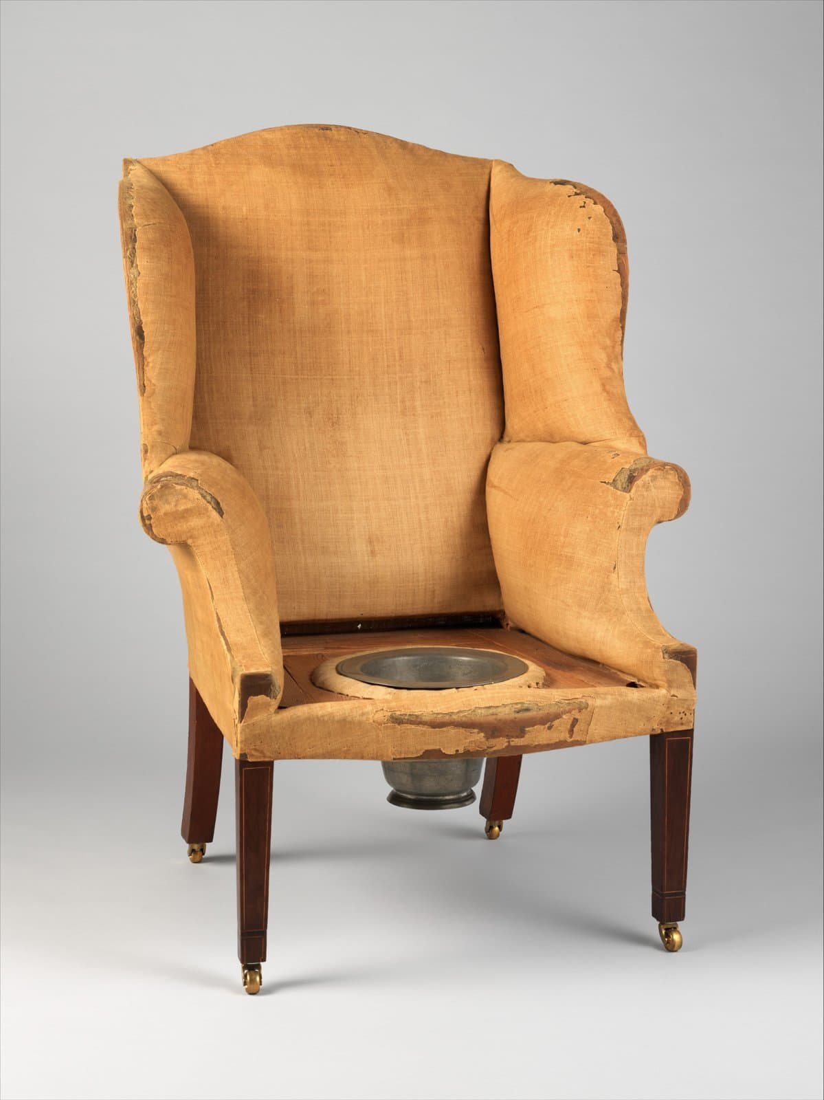 Mahogany easy chair of 1790 to 1800 stripped to its original muslin-covered foundation