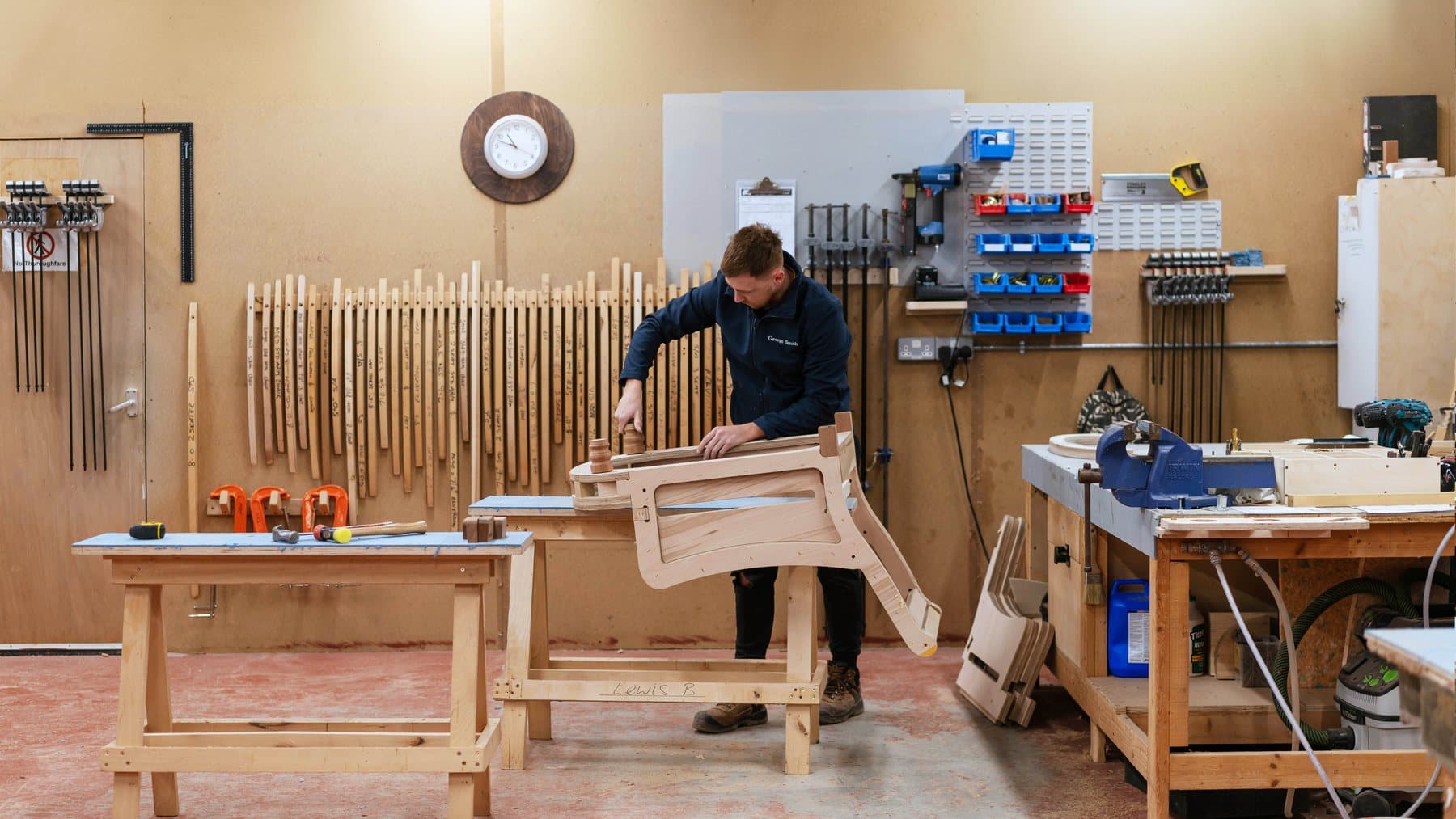 A frame maker at work in the George Smith workshop